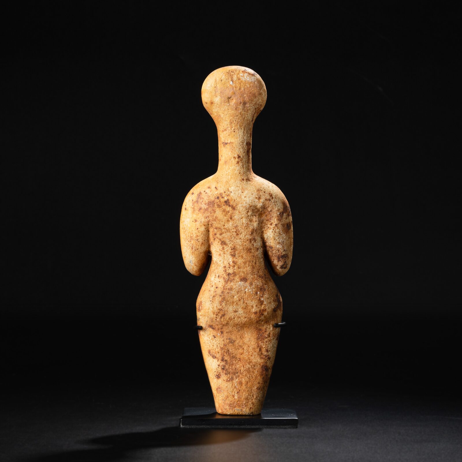 Standing Figure with a Round Head