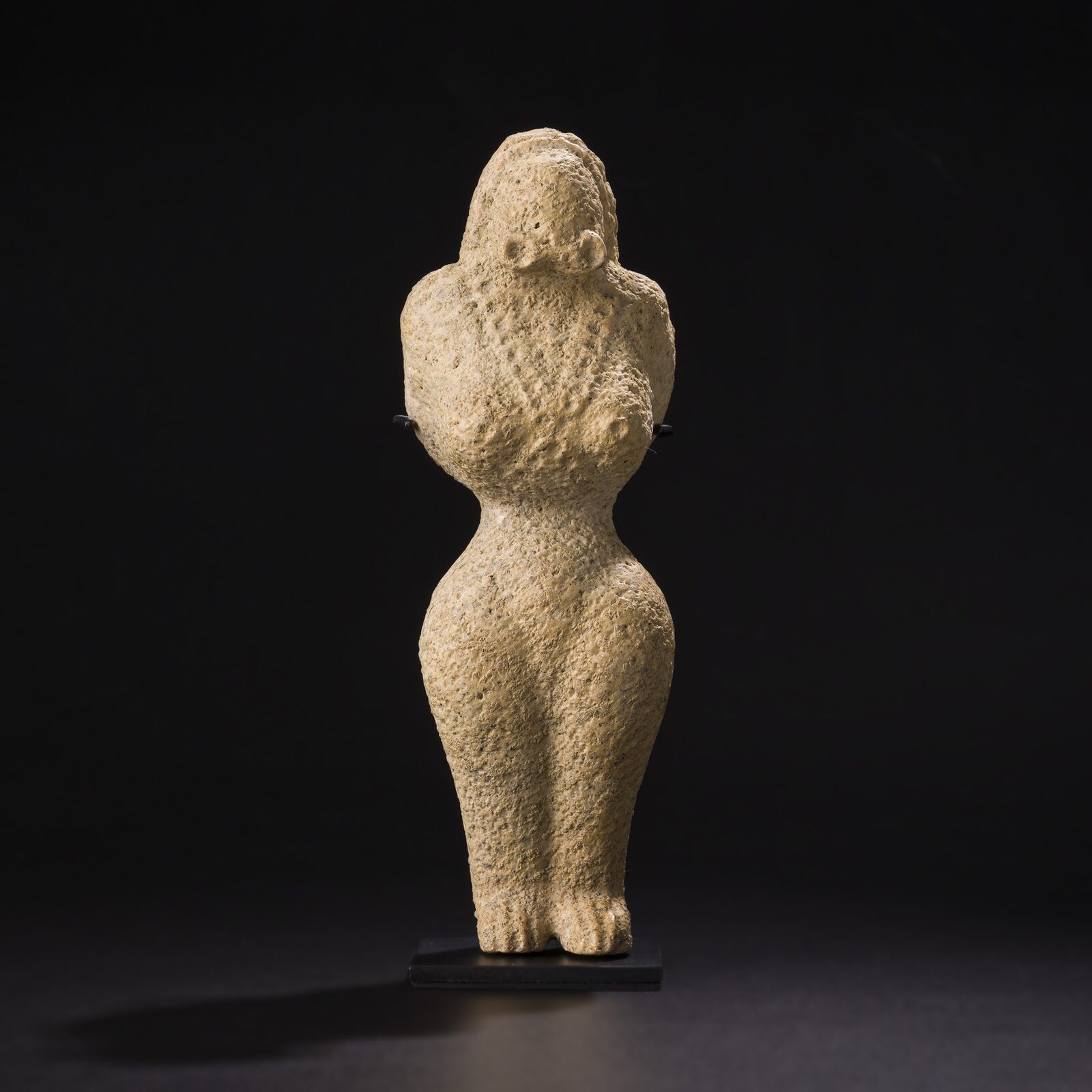 Standing Figure with a Textured Surface