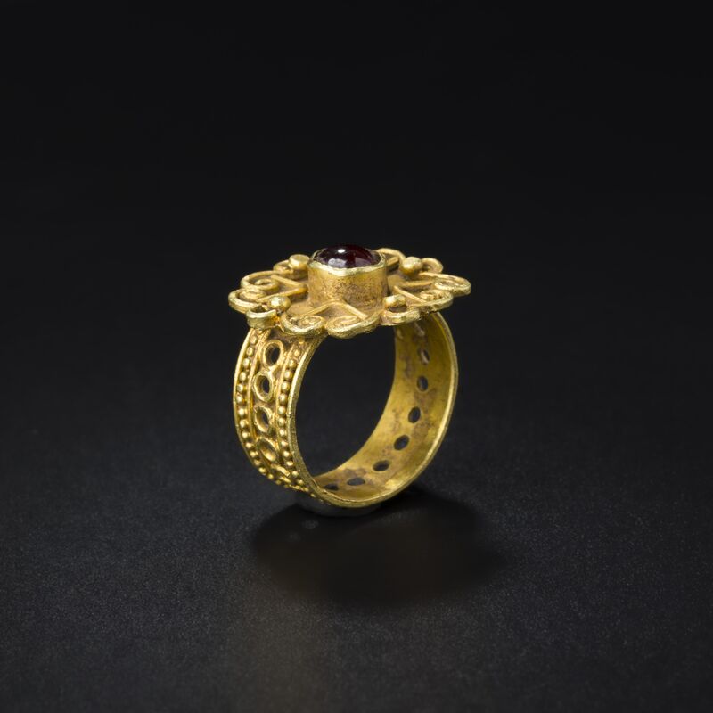 Gold Rosette Ring with a Red Cabochon