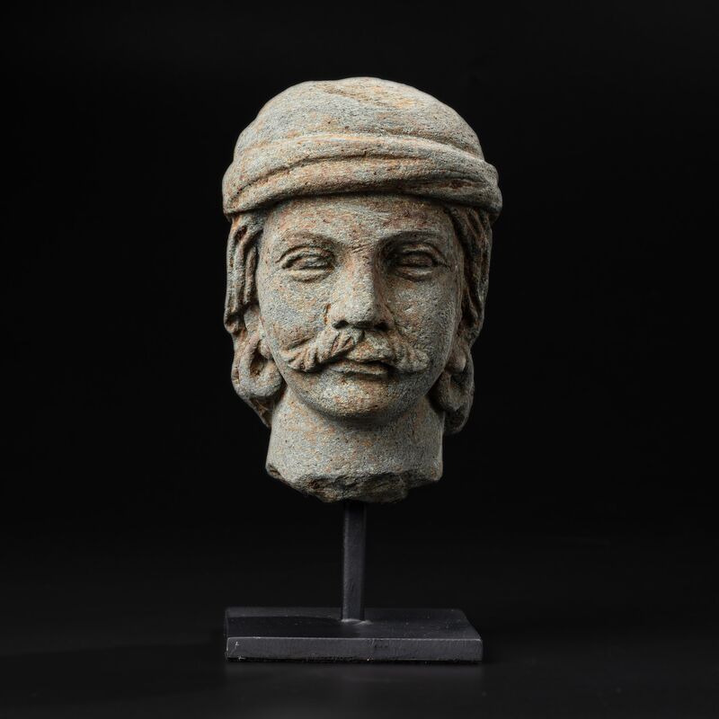 Head of a Man in a Rolled Cap