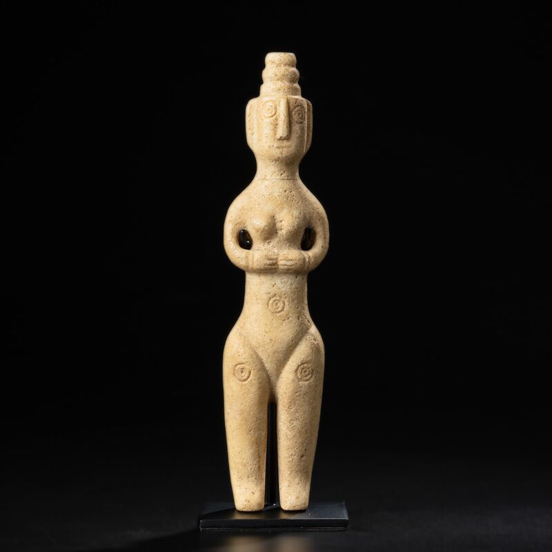 Slender Female Figure with a Stacked Headdress