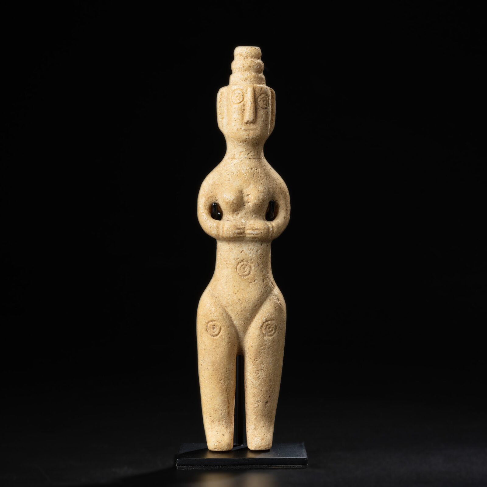 Slender Female Figure with a Stacked Headdress