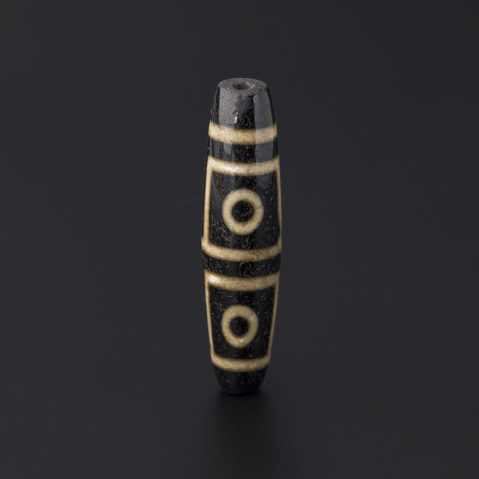 Three-Eyed Bead in the Tibetan Dzi Style